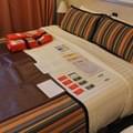 <p>Costa Magica - так выглядят каюты с балконом в Costa Magica - на кровати разложены приветственные материалы и карточки.</p>